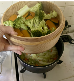 スープの上でせいろ蒸しの写真